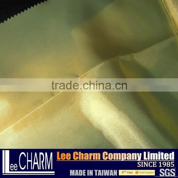 Luxury Golden Shimmer Satin Fabric Material photo-6