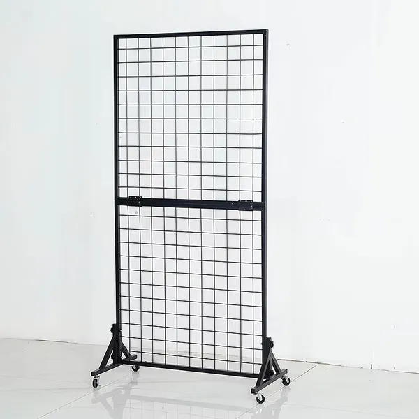 Two grid wall displays with legs in a black grid wall panel group
