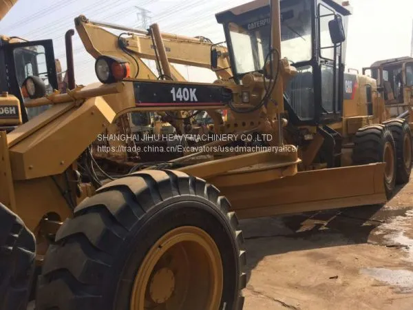 Использованный мотоградар Caterpillar 140K с рыхлителем photo-2