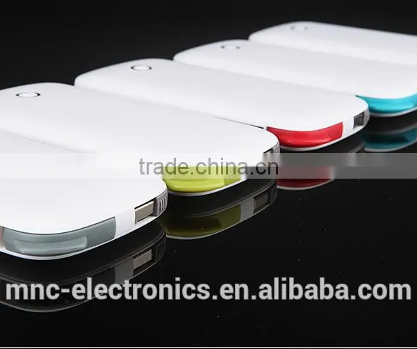 Real 6000mAh Ultra Slim Built in Cable Custom Logo Printing Dual Output 2A Fast Charging Power Bank Charger photo-2