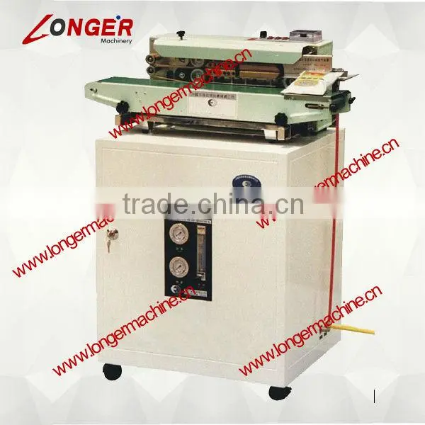 Automatic Nitrogen Filling and Bag Sealing Machine|Snacks Bag Sealing Machine|chips Bag Nitrogen-filling and Sealing Machine