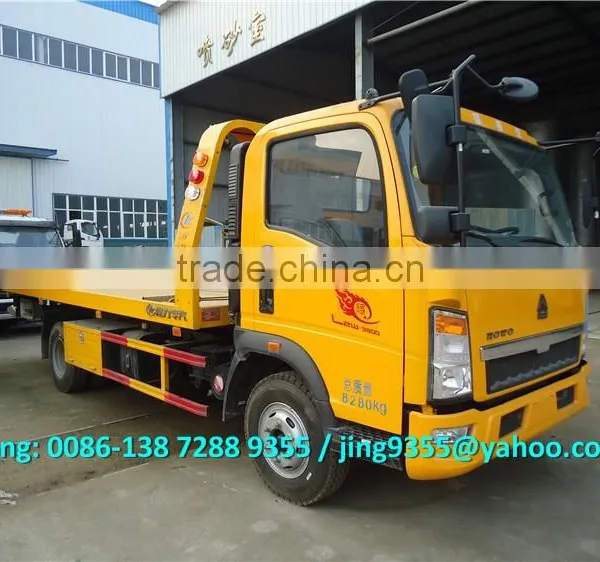 HOWO 3800mm Wheelbase Cheap Wrecker Tow Truck, L5600*W2300 Flatbed Wrecker Towing Truck on Sale in Africa photo-3