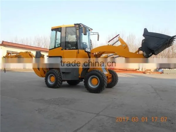 Сельскохозяйственный компактный трактор 5 тонн, 50 л.с., 4x4 с фронтальным ковшом и обратной копалкой photo-2