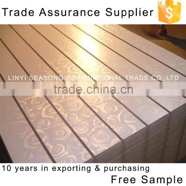 China 1220*2440*15mm e1 Glue Rose Design Slotted Density Board/ Decorative Wall Board Used for Displaying Goods in Super Store