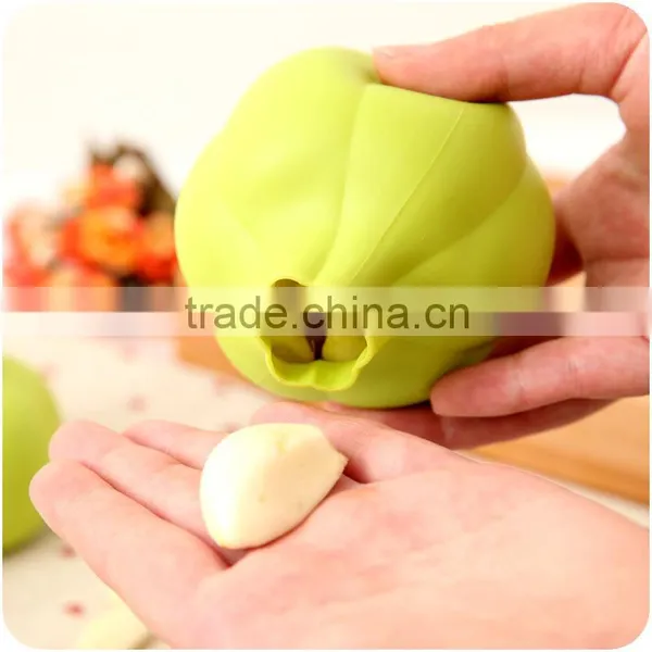 2016 Hot Sale Magic Kitchenware Silicone Garlic Peeler Silicon Peeling Presses photo-3