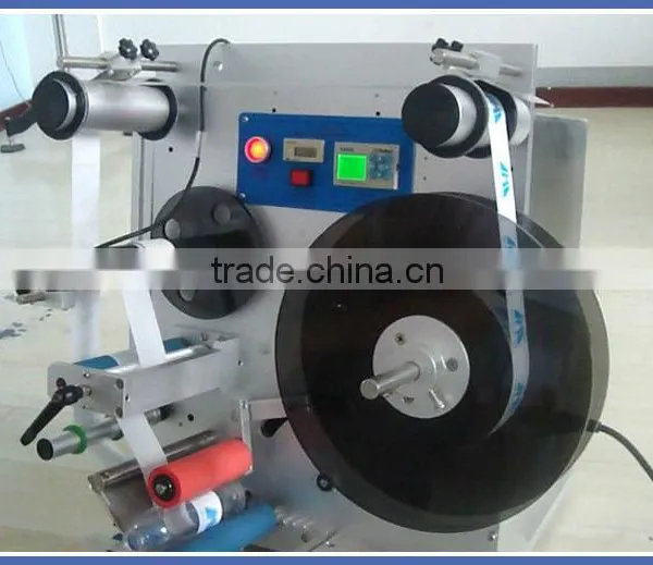 Semi Automatic Labeler / Round Bottle Labeling Machinery / Roll Bottle Sticker Labeling Machine photo-2