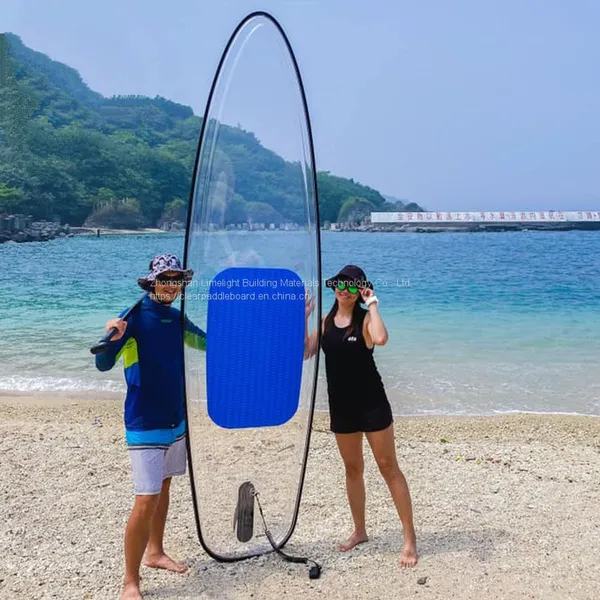 Crystal Clear Paddle Board With Blue Pad and Black Rim for SUP Adventure