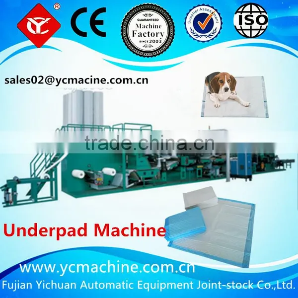 Pet pad under pad machine