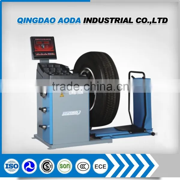 Portable truck wheel balancer