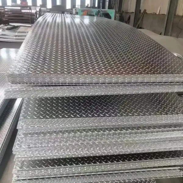 Widely Use Embossed Checkered Steel Coil Q235B A36 Ss400 S235jr Carbon Steel Sheet photo-2