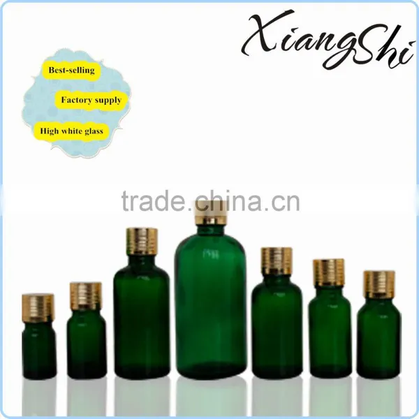 Transparent Green Glass Essential Oil Bottles Factory With Gold Cap