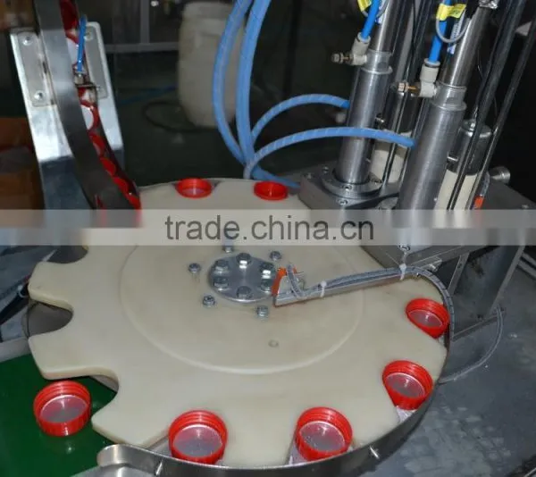 Automatic Filling Foil Into the Cap Machine photo-2