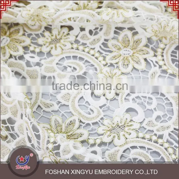 Hot selling graceful flowering design net luxurious golden metallic thread qmilch and cord latest embroidery lace designs                        
                                                Quality Choice