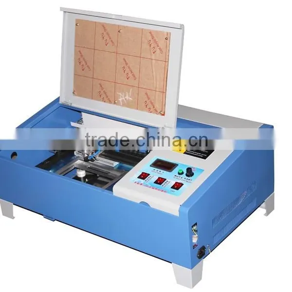 2015 New Version 40W LY 3020 CO2 Digital Laser Engraving Cutting Machine With Digital Function With Drag Chain Design photo-4