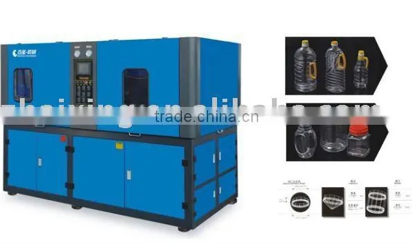 Hand feeding blow molding machine