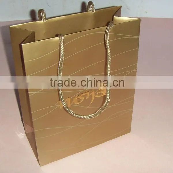 luxury gold color handle shopping paper bag with high quality