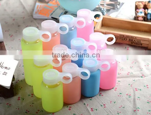 Different Color Beautiful Glass Water Bottle With Silicone Sleeve for Sale