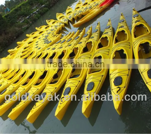 two person sit in ocean kayak