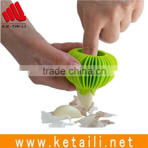 2016 Hot Selling High Quality Silicone Garlic Peeler Garlic & Onion Peeler Machine photo-3
