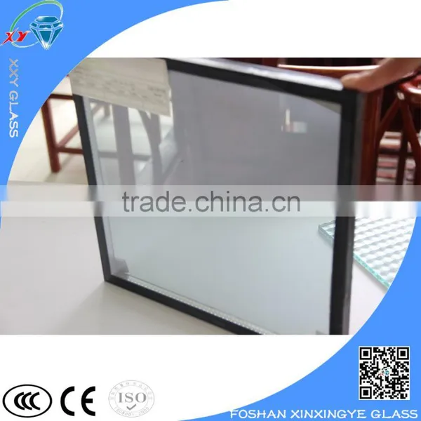 Unbreakable insulated glass garage door panel