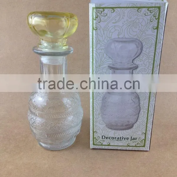 clear body yellow lid glass diffuser bottle