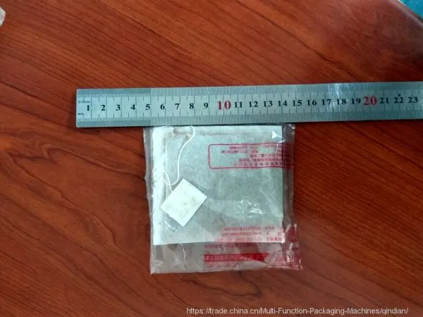 Full Automatic Filter Tea Bag With String and Tag Enveloped Packing Machine photo-5