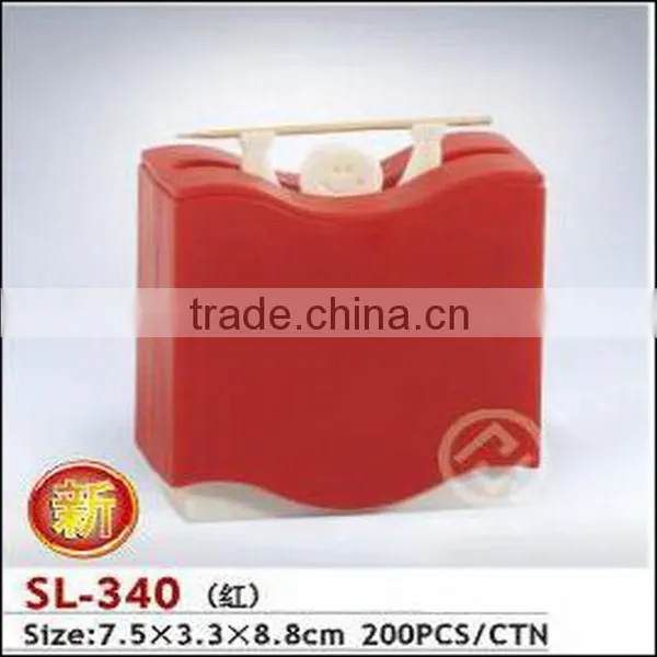 Plastic red toothpick jar