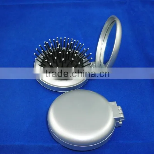 Mirror With Comb