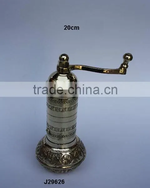 Coffee hand grinder with round base made in brass and polished finish