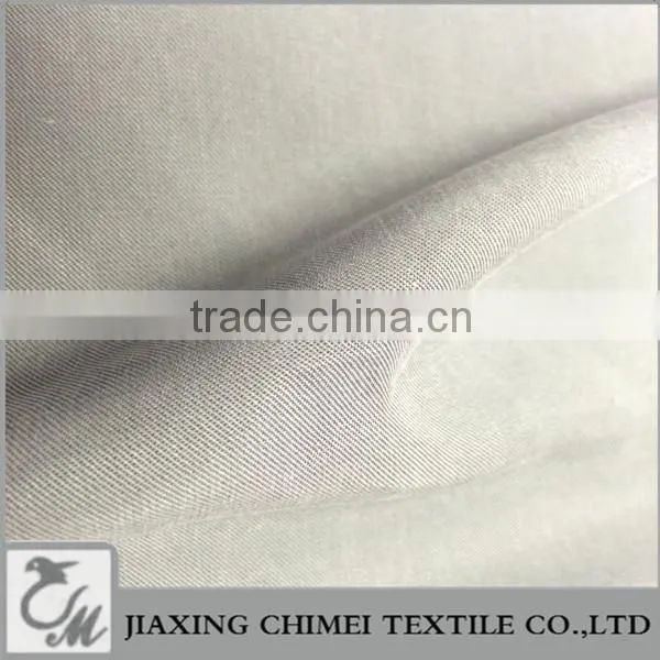 Jiaxing Popular Shirt Fabric of Twill Fabric Cupro Polyester Fabric photo-2
