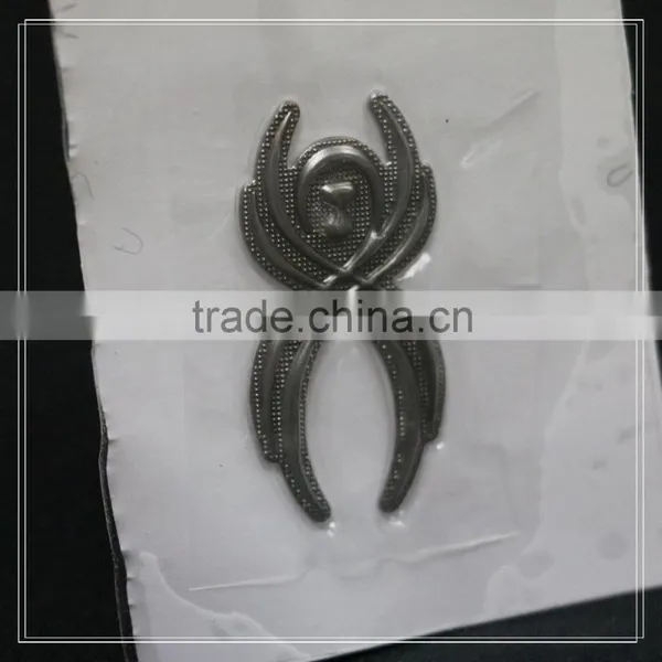 TPU Injection Customized Metal Logo Rubber Patch Iron on Garment photo-2