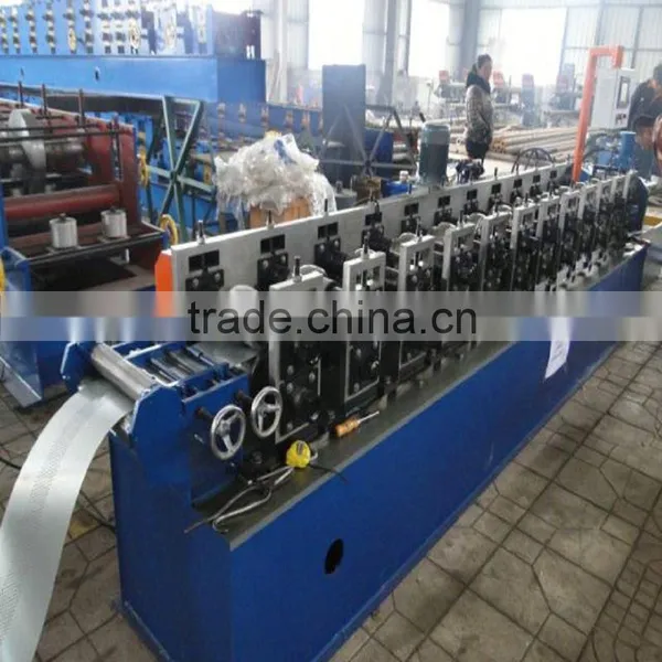 Cold Roll Forming Machine Good Appearance Steel Profile Roller Shutter Door Gate Frame Shapping Machine photo-2