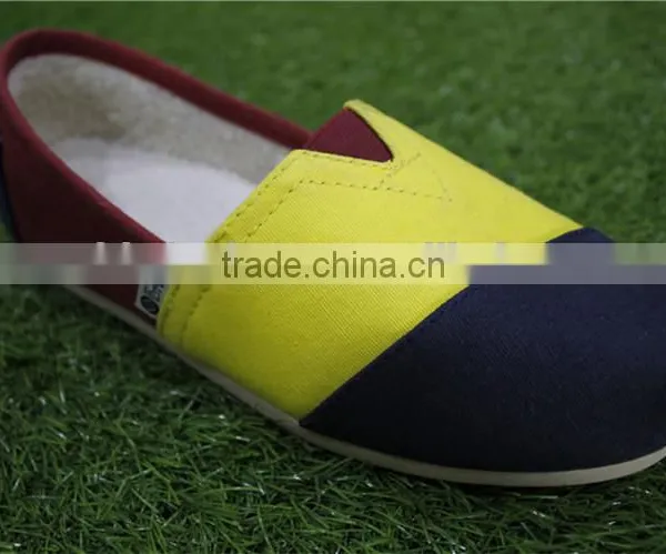 China Cheap Mens Stock Canvas Shoes