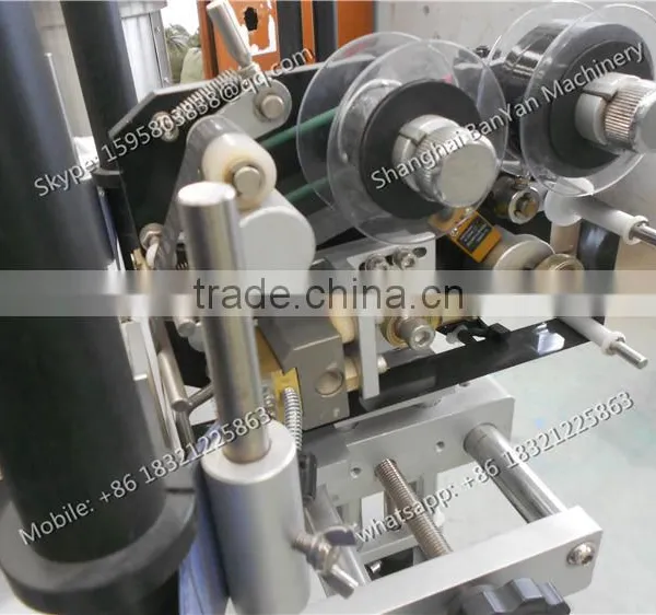6 Shanghai Manufacturer High Efficiency Glass/ Plastic Round Bottle Labeling Machine photo-6