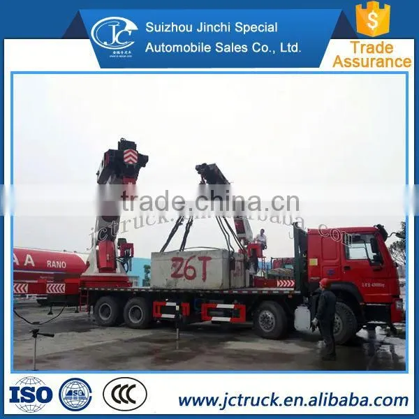 China New Automatic Hydraulic Howo 8x4 Lorry-mounted Crane Large Goods Reasonable Price photo-4