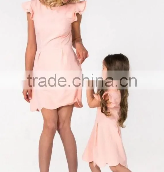 High Quality Pink Ruffles Sleeves Mommy And Baby Matching Short Frock Designs Dress Women Casual photo-2