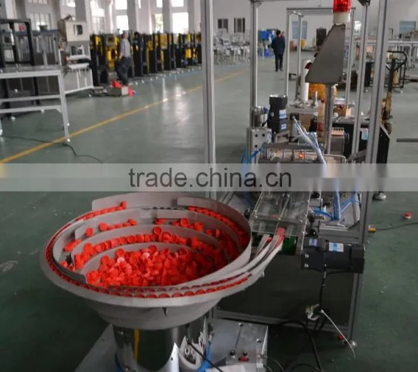 Automatic plastic cover dropping machine
