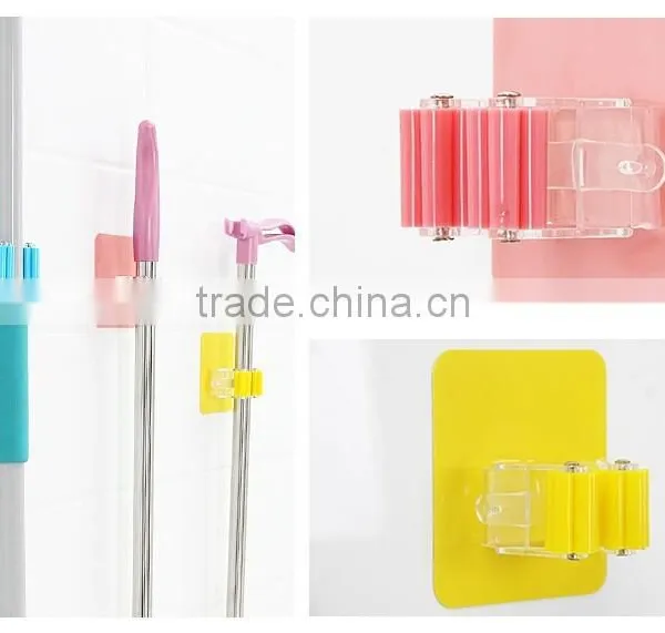 Wholesale Stock Magic Wall Suction Plastic Mop Handle Storage Holder photo-4