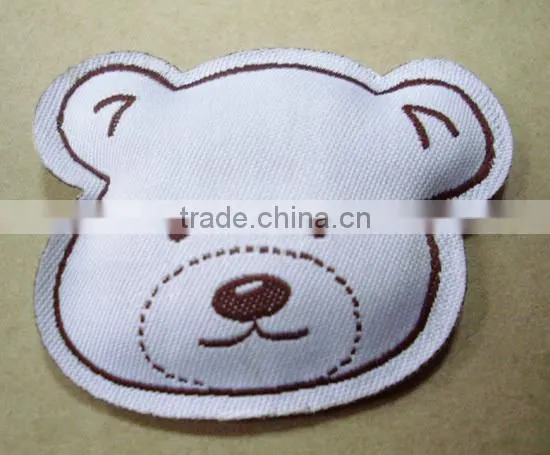 China Hot Sale Custom Lovely Stuffed Cotton Filling Woven Label for Garment photo-2