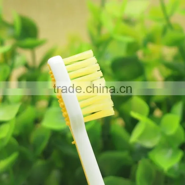 Rubber Handle Small Head Natural Bristle Child Toothbrush photo-5