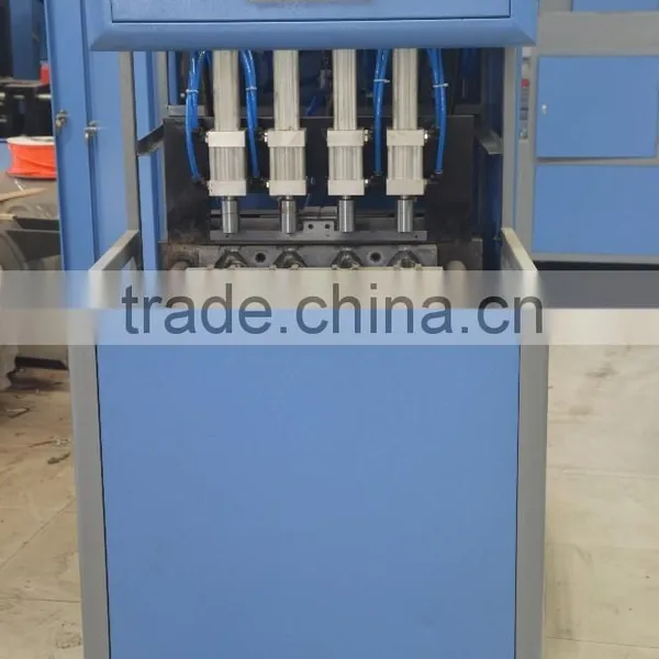 High Quality Semi Automatic 4 Cavities Drinking Water Bottle Blow Molding Machine photo-4