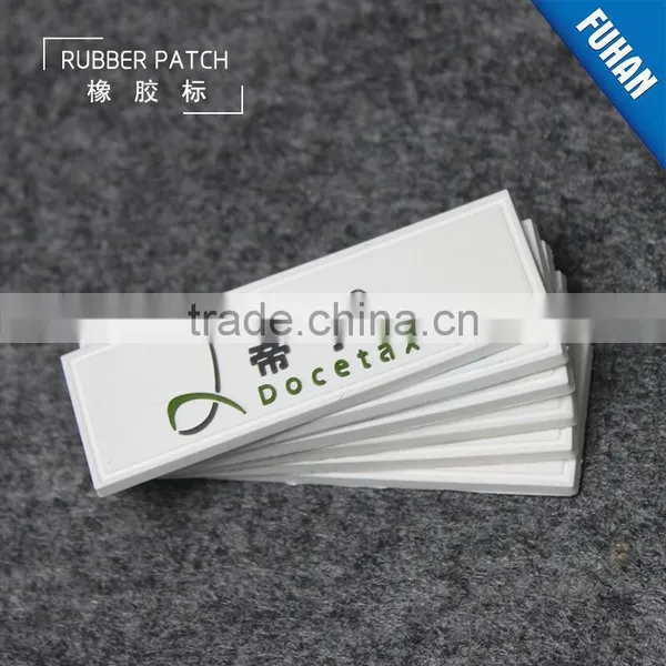 Embossed Custom White Background PVC Rubber Patch Logo photo-4