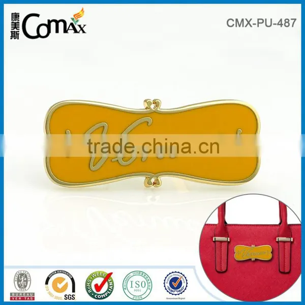 Different Color Filled Custom Fancy Handbag Metal Logo photo-2