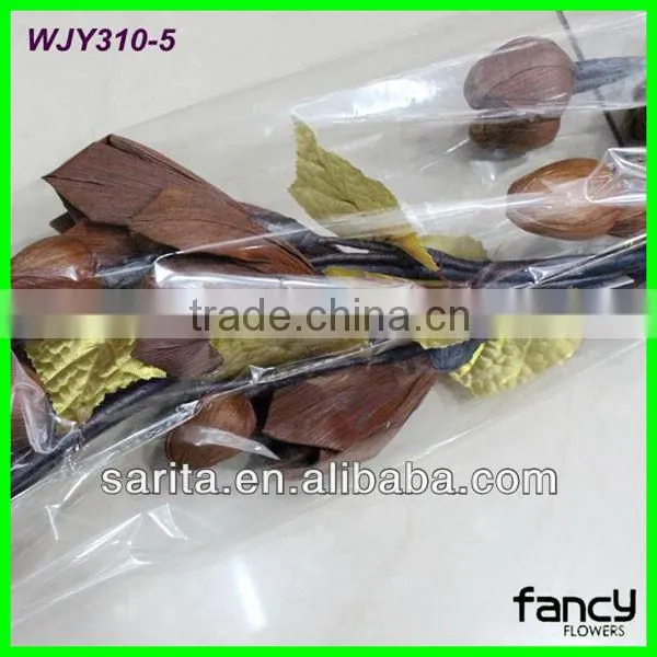 long wooden stem and corn husk decoration flower