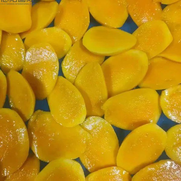 Premium IQF Frozen Mango Halves for Retail and Wholesale Distribution photo-2