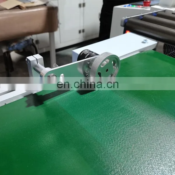 Customized Automatic Adhesive Waxed Woven Filter Wool Cutting Machine photo-5