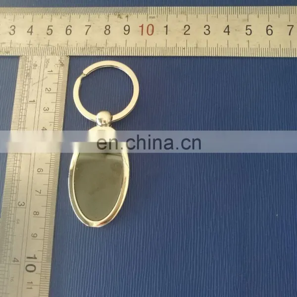 Metal Oval Key Chain With Logo in Epxoy photo-2