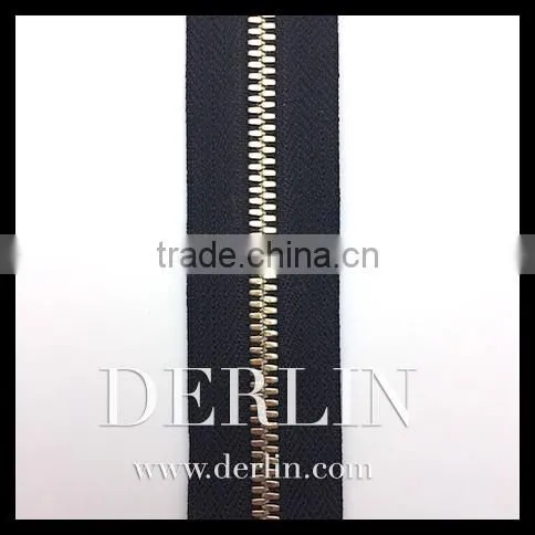 Shiny Gold High Quality Polished Open-end Corn Teeth Symmetric Metal Zipper photo-3