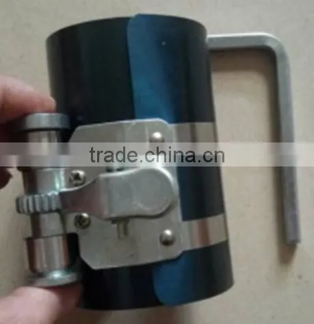 Piston ring compressor