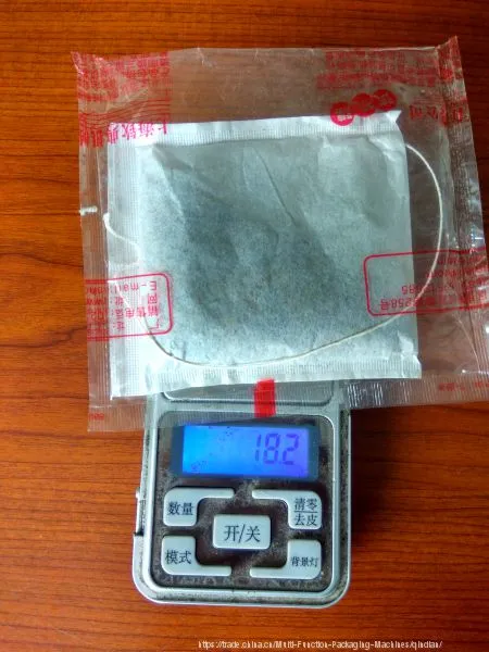 Full Automatic Filter Tea Bag With String and Tag Enveloped Packing Machine photo-3